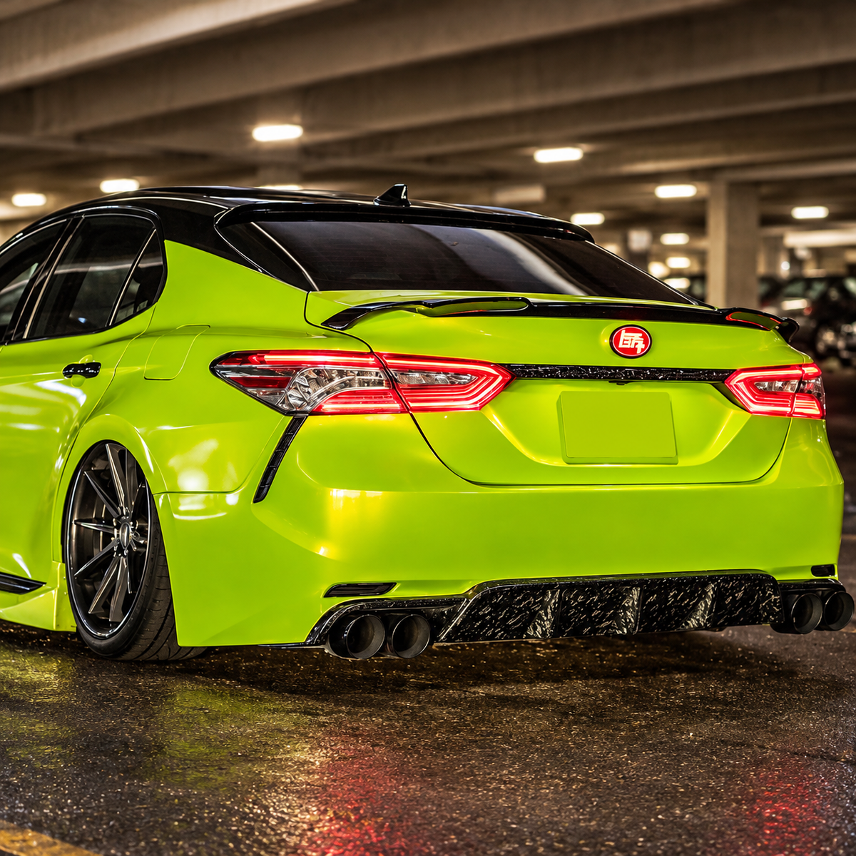 2018-2024 Camry K-Style Hollow-Side Trunk Spoiler — K-style spoiler on a green Camry, straight rear view