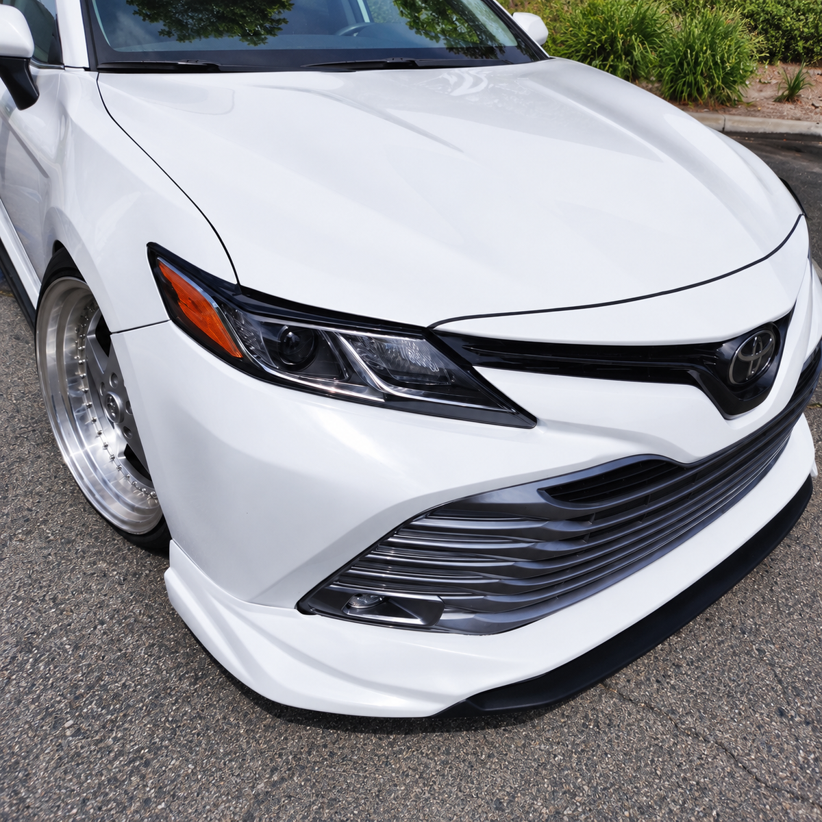 2018-2024 Camry Gloss Black Headlight Eyelid Covers — headlight eyelids installed, opposite front angle