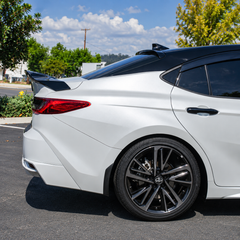 2025-2026 Camry R-Style High-Kick Duckbill Trunk Spoiler — R-style spoiler on the trunk lid, rear-quarter detail