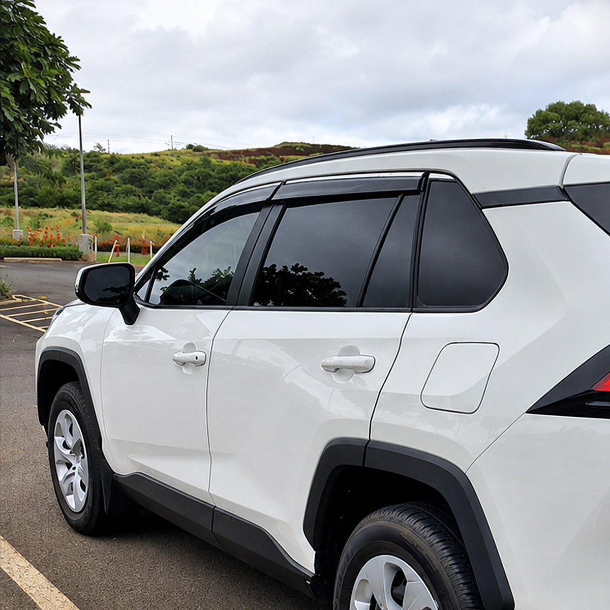 2019-2025 Toyota RAV4 light-smoked 4-piece window visors, product and installed view 1