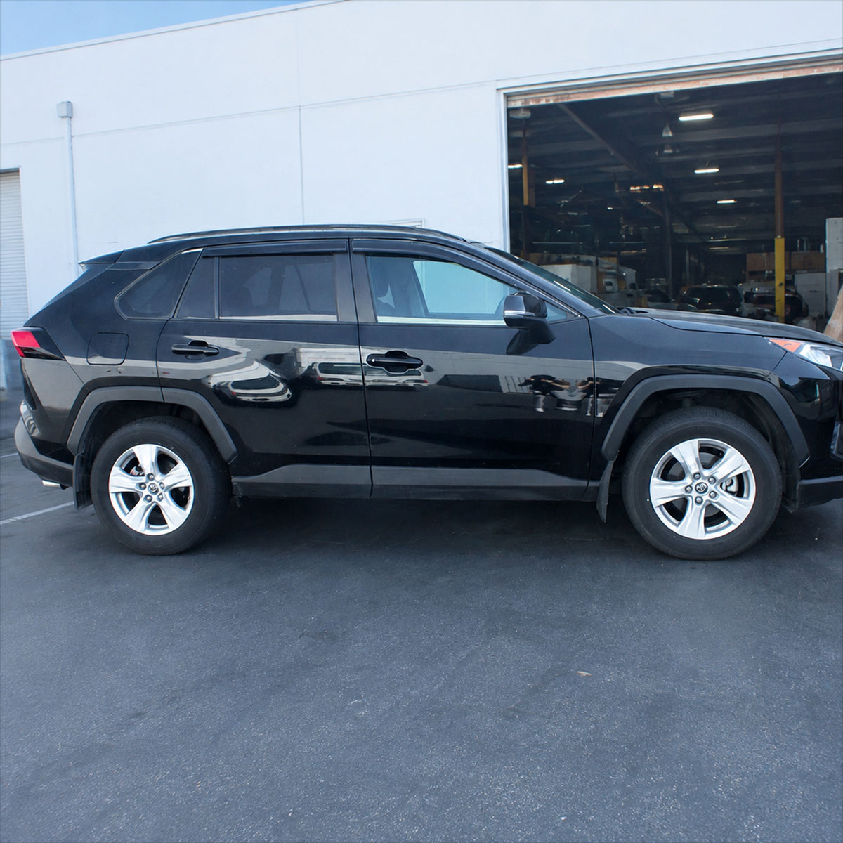 2019-2025 Toyota RAV4 light-smoked 4-piece window visors, product and installed view 4