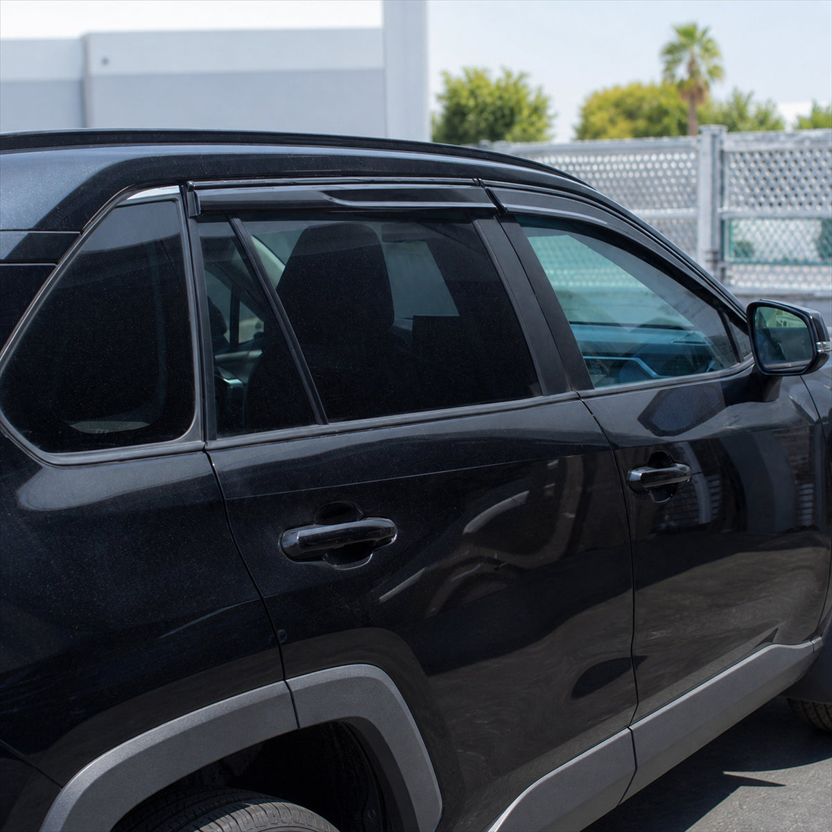 2019-2025 Toyota RAV4 light-smoked 4-piece window visors, product and installed view 5