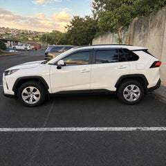 2019-2025 Toyota RAV4 light-smoked 4-piece window visors, product and installed view 11