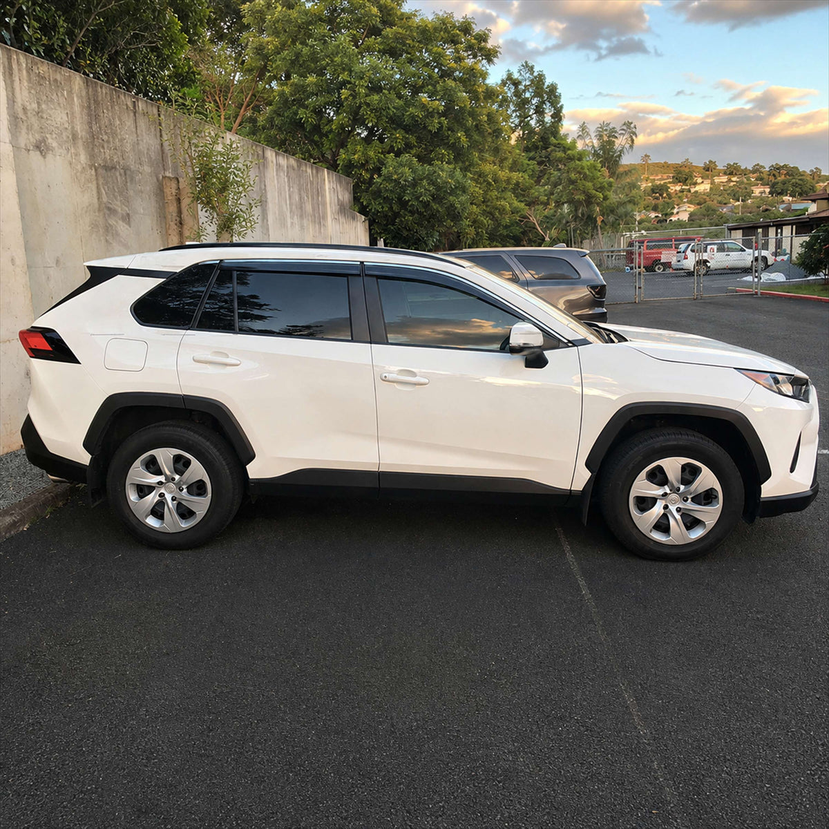 2019-2025 Toyota RAV4 light-smoked 4-piece window visors, product and installed view 14