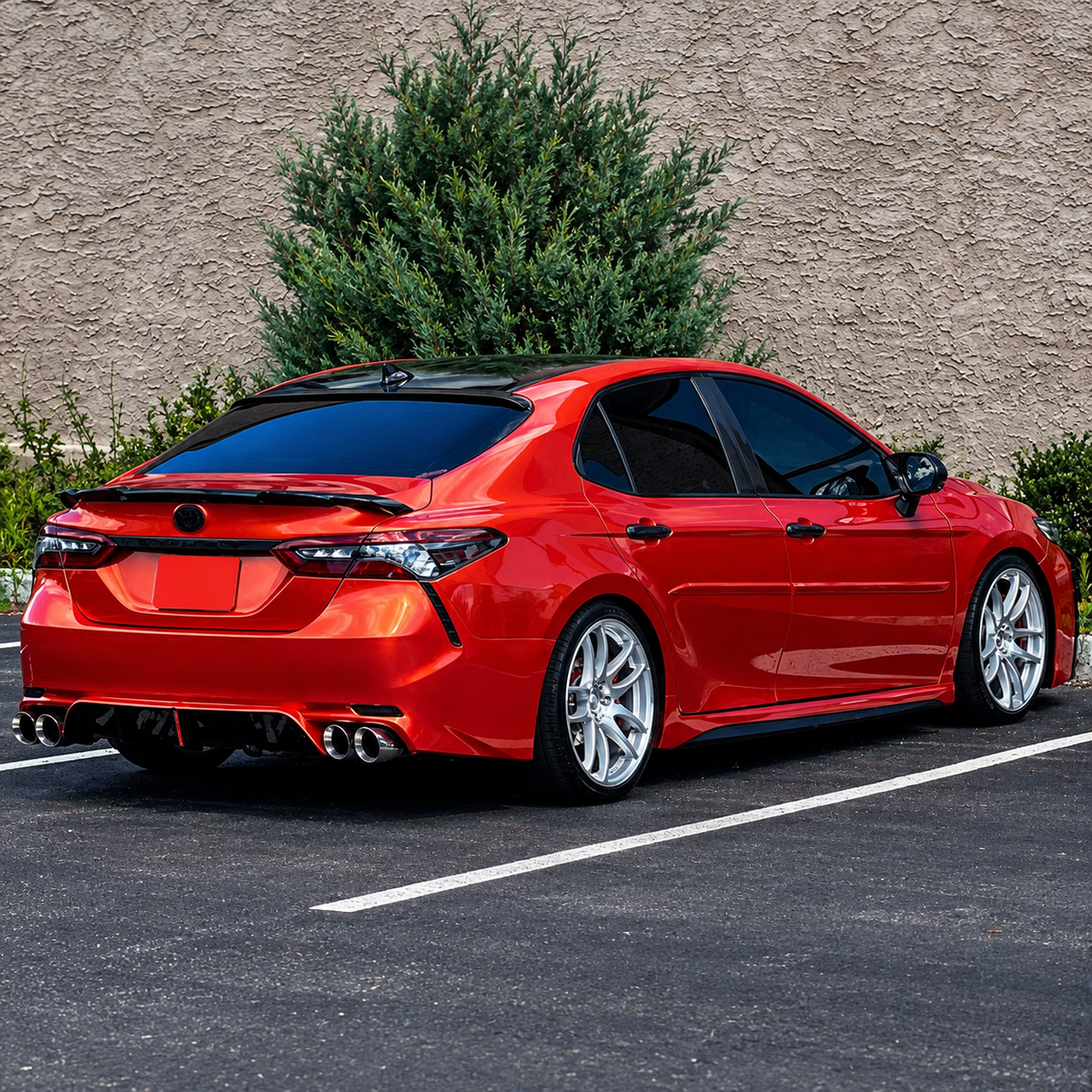 2018-2024 Camry K-Style Hollow-Side Trunk Spoiler — K-style spoiler on a red Camry, rear three-quarter view