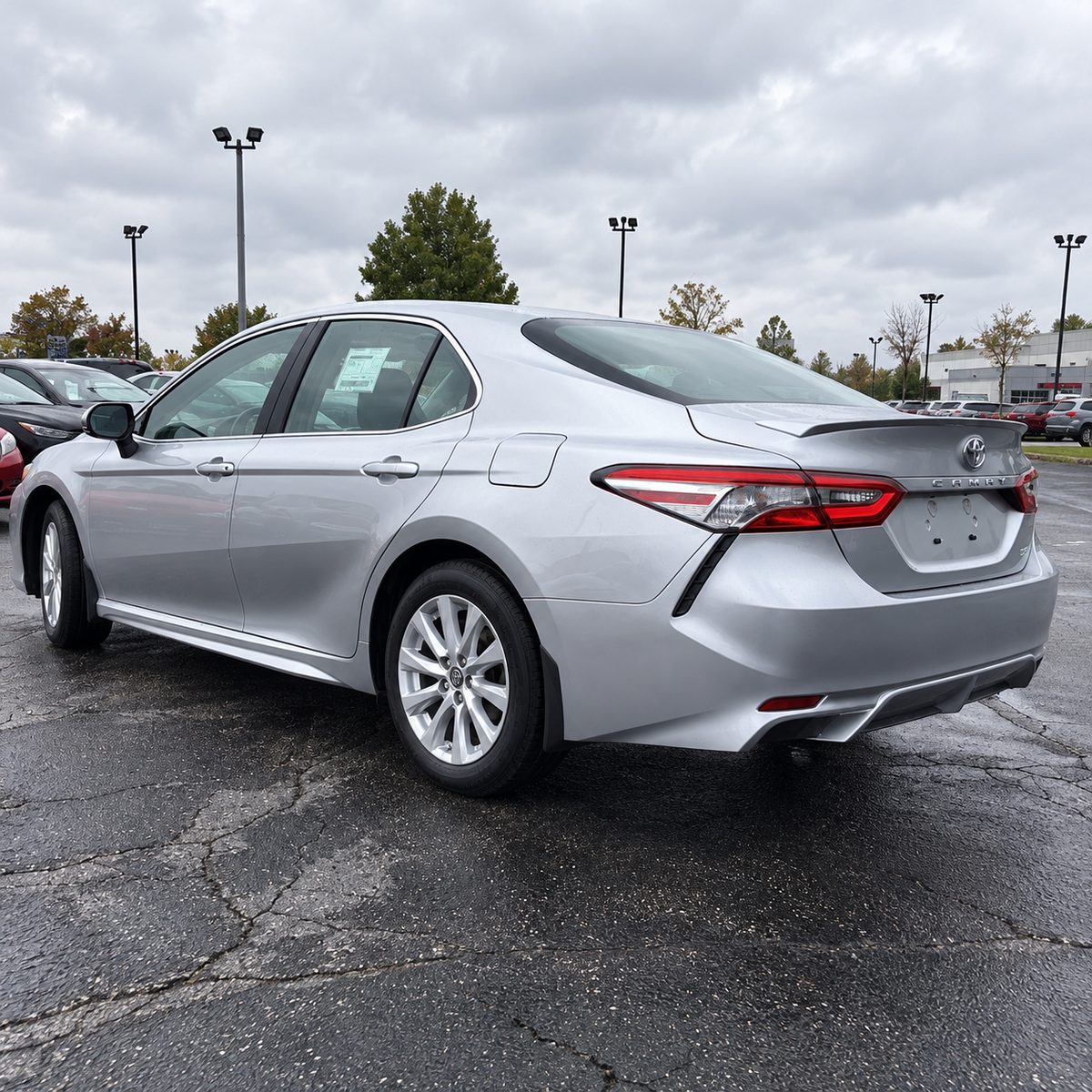2018-2024 Camry SE/XSE 4-Piece Splash Guards — splash guards on a silver Camry, rear angle