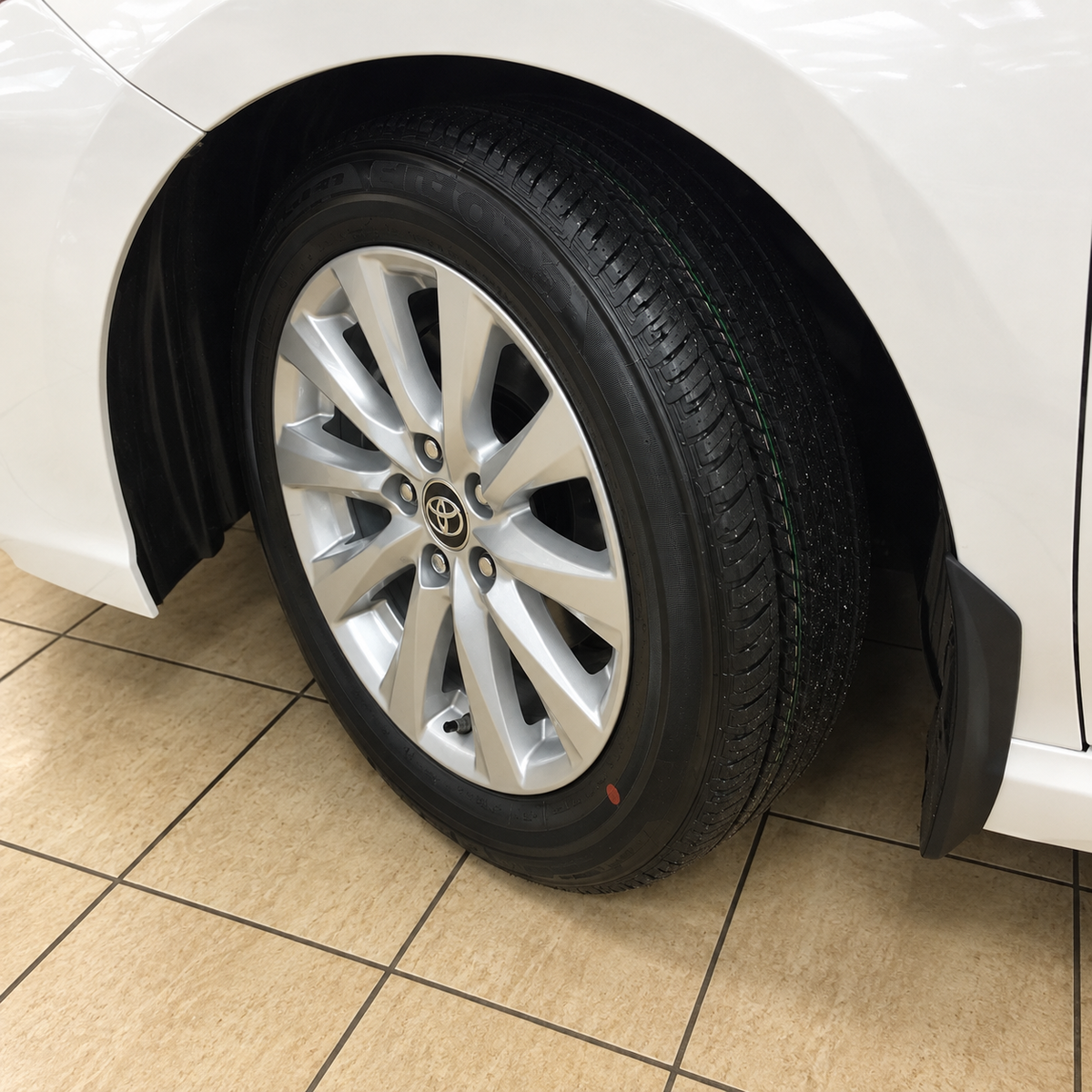 2018-2024 Camry SE/XSE 4-Piece Splash Guards — splash guard mounted behind a front wheel